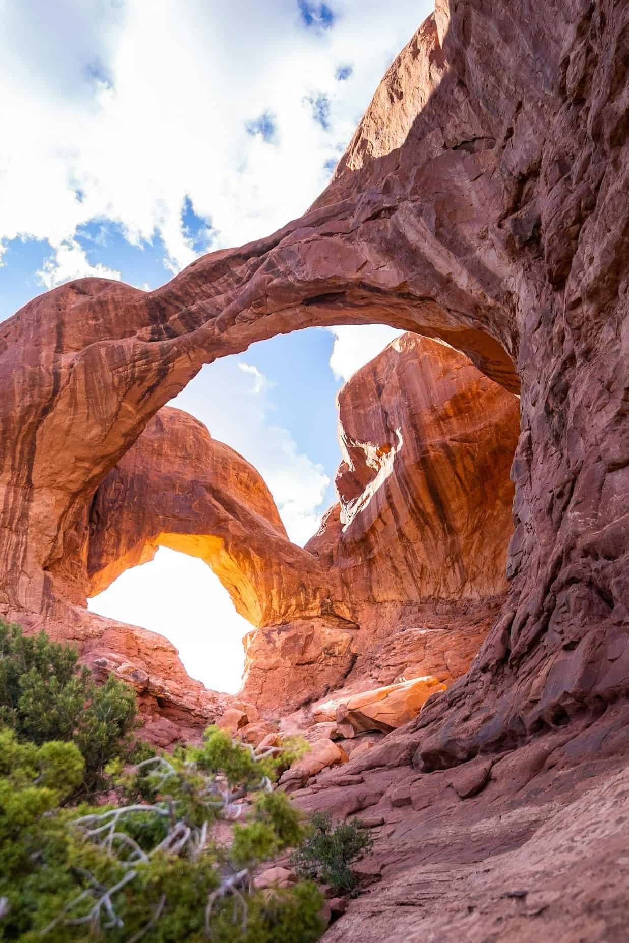An easy hike to the breathtaking view of Double Arch at Arches National Park, showcasing its natural beauty.