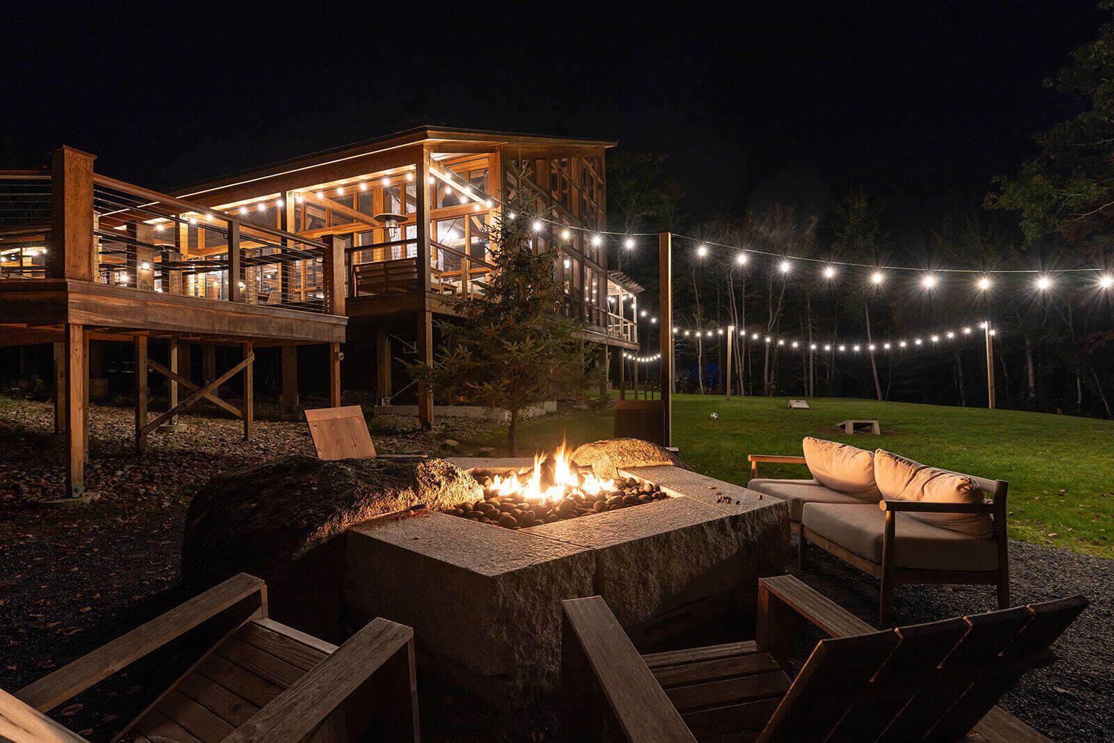 Terramor Outdoor Resort with fairy lights and fire pit near Acadia National Park