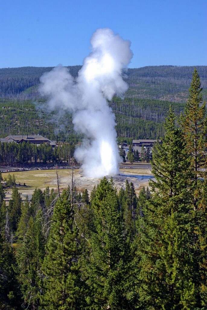 Old Faithful Inn inside of Yellowstone National Park is the perfect place to watch the geyser erupt