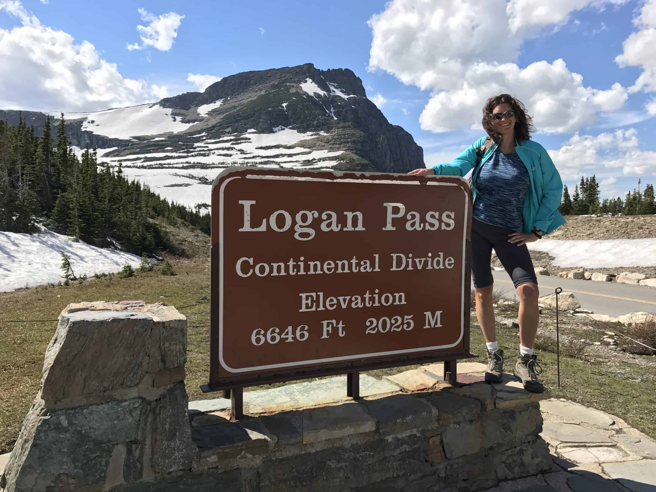 Standing on the Continental Divide at Logan Pass in Glacier National Park