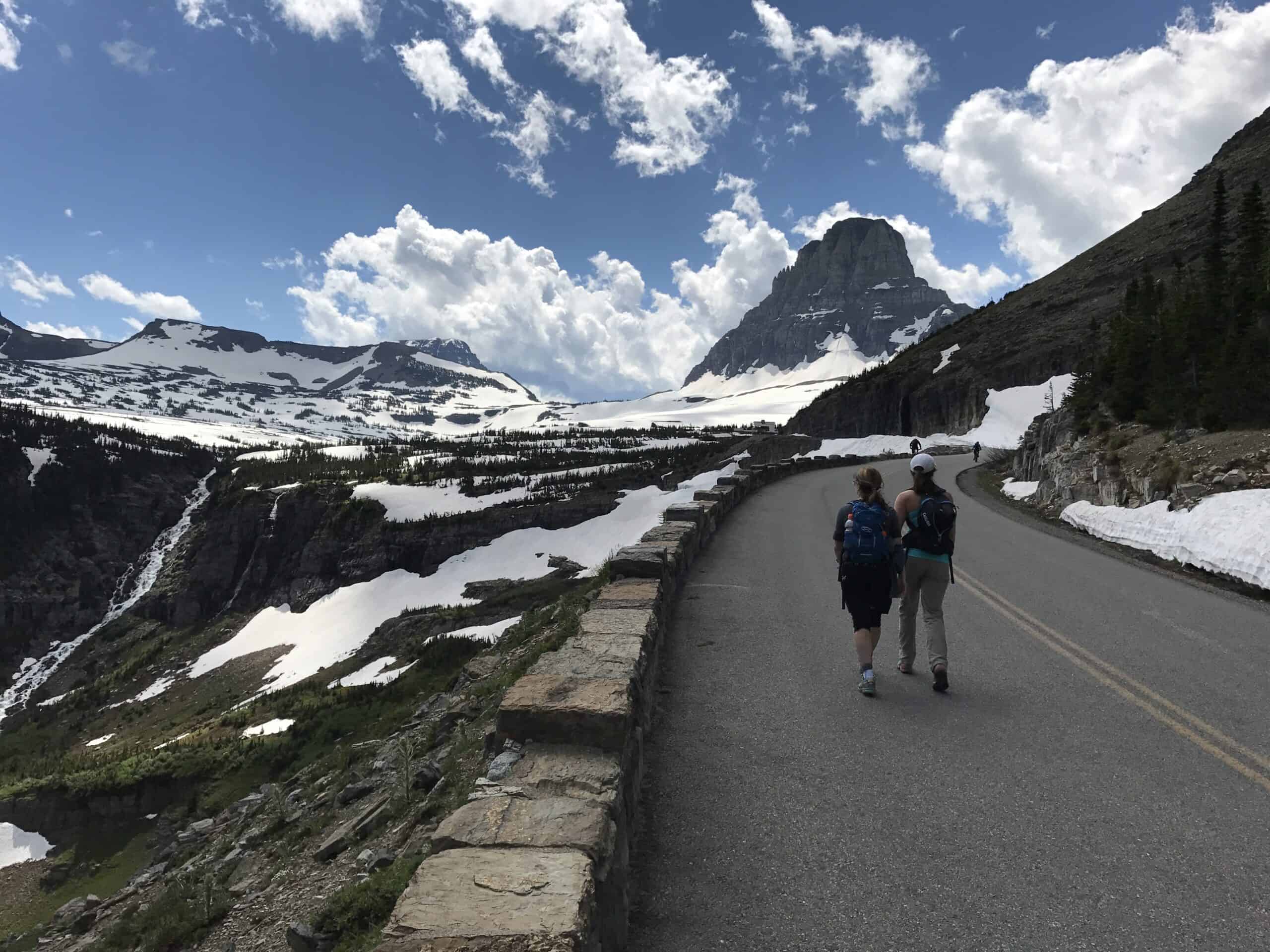 Hikers Walking a stretch of the Going-to-the-Sun-Road to Logan Pass when it was closed for snow (it was a long walk!)