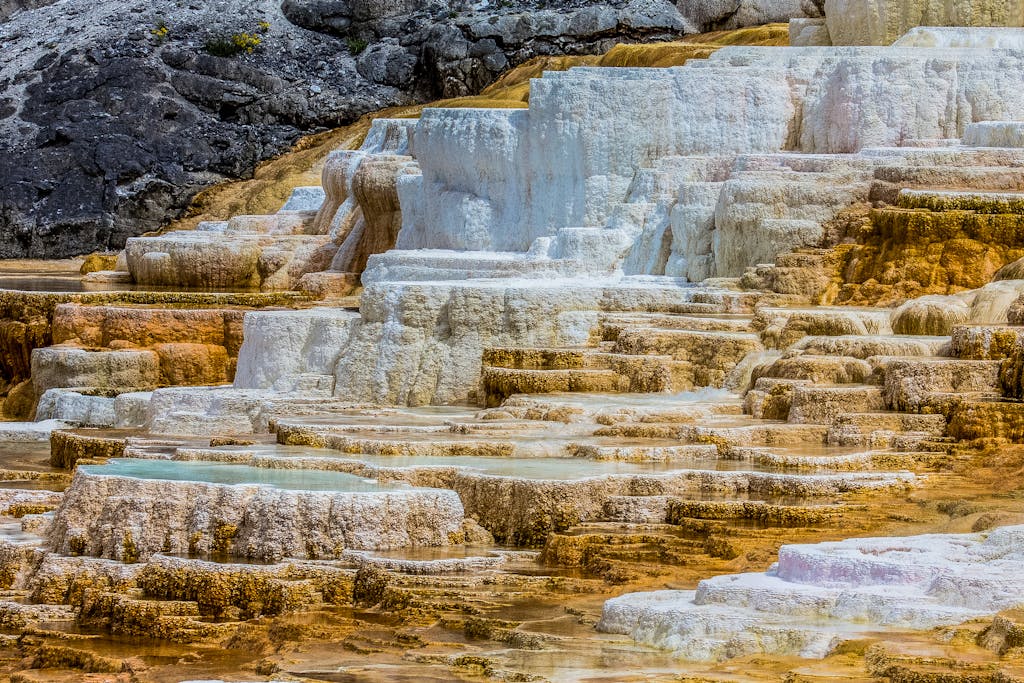 Colorful limestone terraces of Mammoth Hot Springs in Yellowstone National Park.