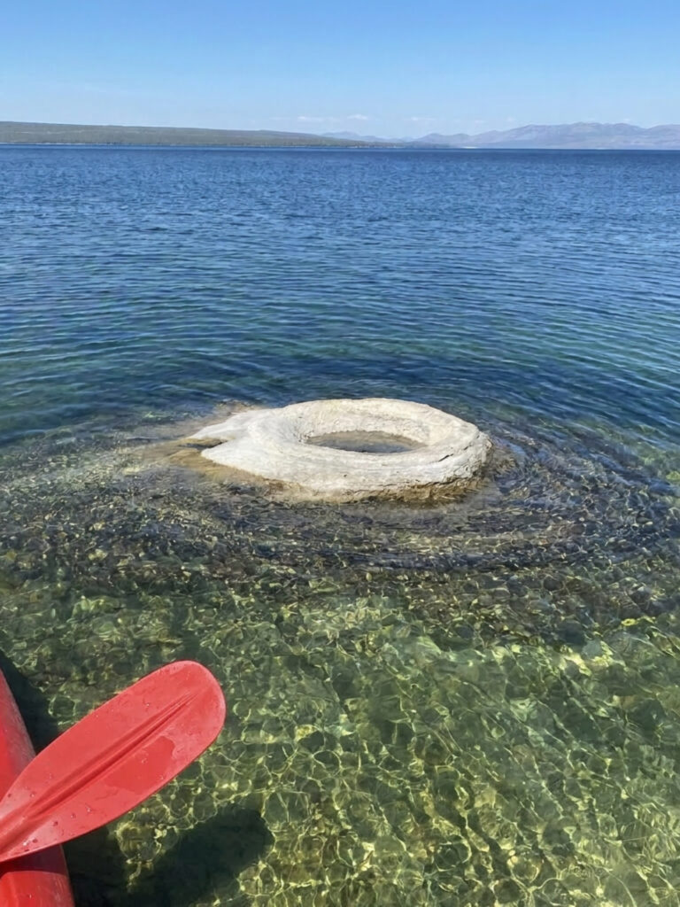 Kayaking near the geothermal features of West Thumb Basin in Yellowstone National Park