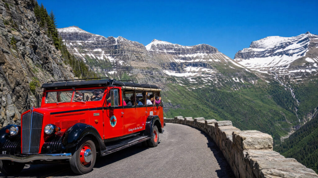 Red Jammer Going-to-the-Sun Road Bus tour in Glacier National Park going over Logan Pass