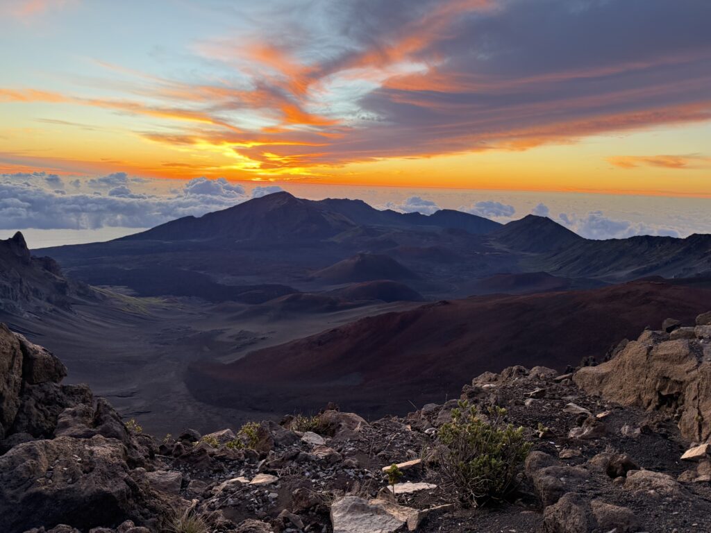 Sunrise with golden sky over Haleakalā National Park in Maui, Hawaii