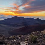 Sunrise with golden sky over Haleakalā National Park in Maui, Hawaii