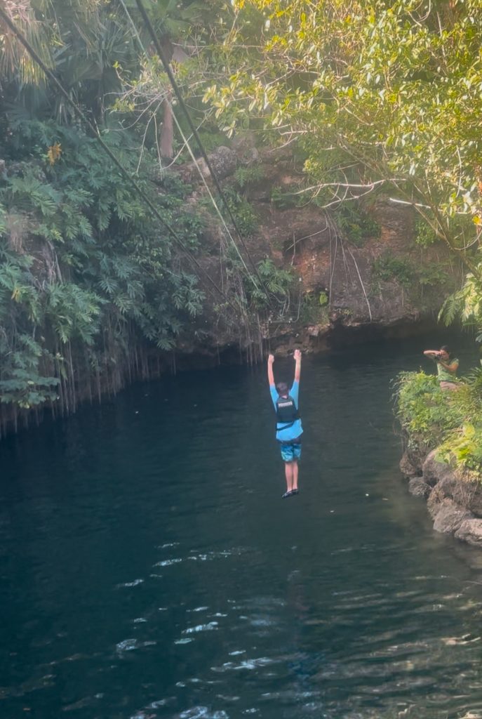 Zip line jump into the cenotes on the Cenotes tour by Xcaret, Playa del Carmen, Mexico