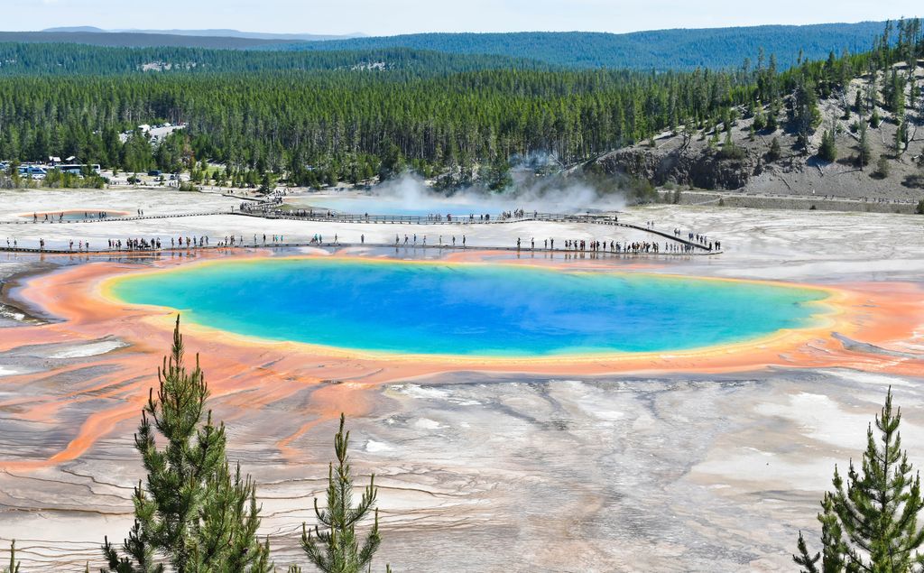 A vibrant aerial shot of the Grand Prismatic Spring in Yellowstone National Park.